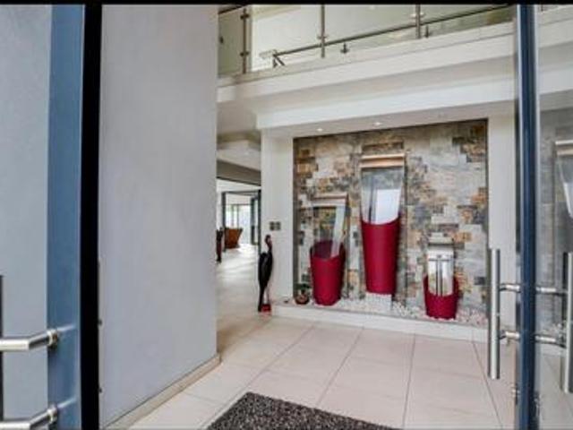 modern 4 bedroom home with cinema an.