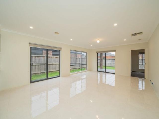 Modern 4 Bedroom, 2 Living Family Home in a Convenient Location