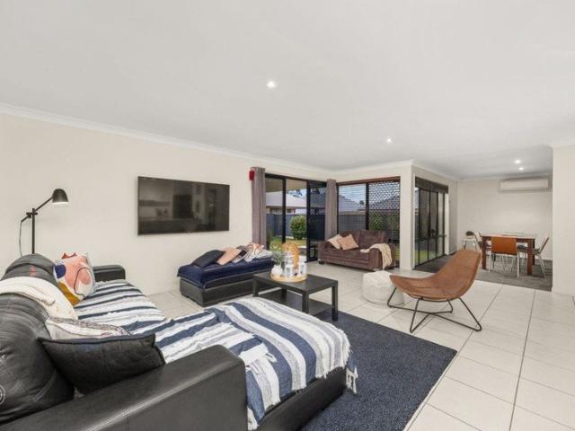 Modern 5 Bedroom Home with Alfresco Living in the Heart of Springfield Lakes