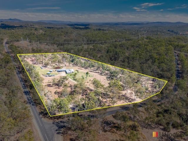 MODERN COUNTRY LIVING ON A BEAUTIFULLY IMPROVED ACREAGE
