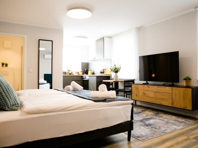 Modern & Cozy Studio with Designer Kitchen, Dining Area & Smart TV