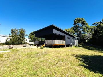 Modern Coastal 2 Bedroom Home with Stunning Deck & Water Views