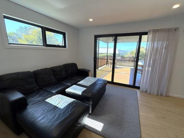 Modern Coastal 2 Bedroom Home with Stunning Deck & Water Views