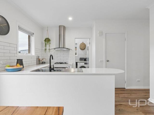 Modern Coastal Townhouse in a Prime Safety Beach Location