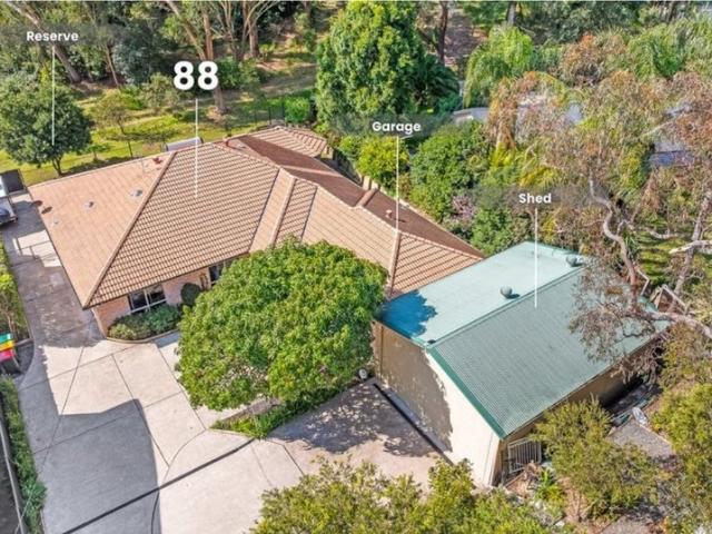 Modern Coastal Home on Rare 1,156m² Block Backing Bushland, Minutes to Beaches & Marina