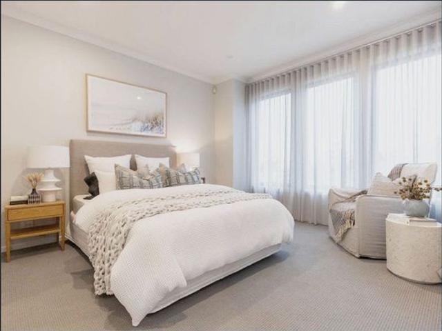 Modern Coastal Home Close to Schools + Short Distance to Point O'Halloran Waterfront + 2 Living Areas