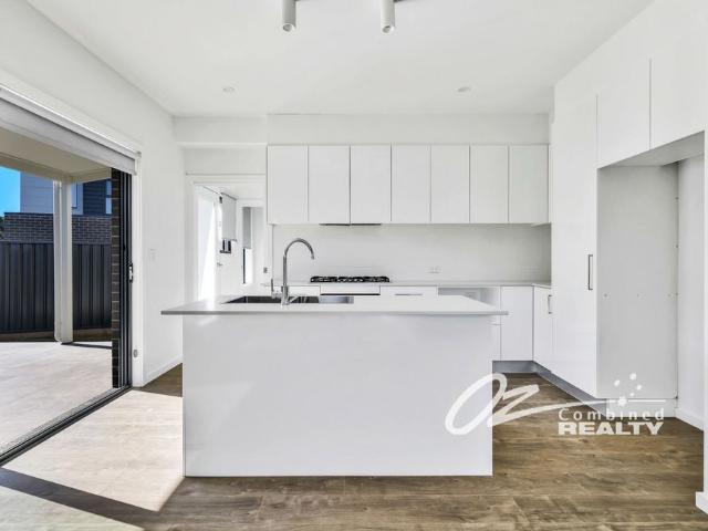 Modern Coastal Living in a 4 Bedroom Spacious Home