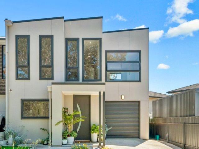 MODERN COASTAL LIVING JUST TWO STREETS FROM THE ESPLANADE!