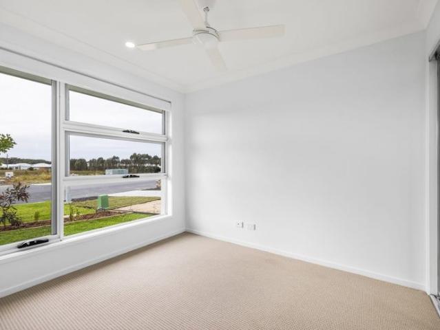 Modern Coastal Living Just Moments from the Fairway