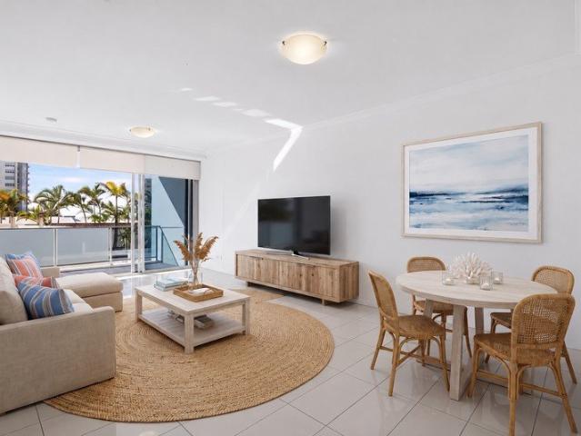 FRESHLY REPAINTED COASTAL RETREAT JUST STEPS FROM THE BROADWATER