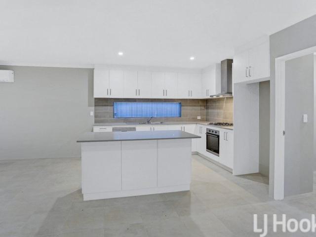 Modern Coastal Living Spacious 4 Bedroom Home with Theatre Room