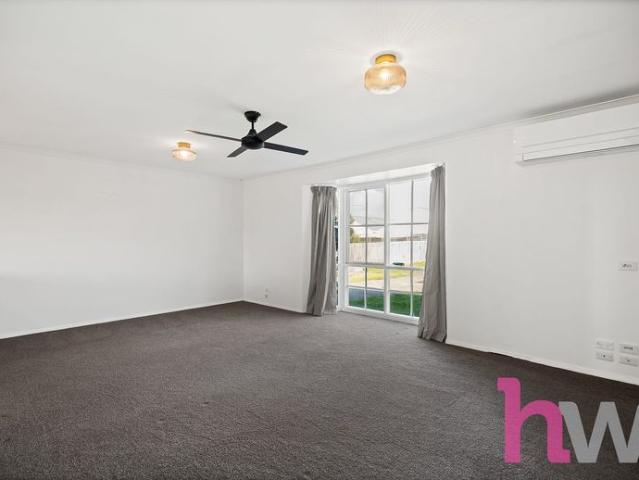 Modern Comfort with a Spacious Backyard in a Convenient Location