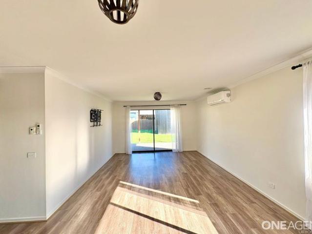 Modern Comfort with Garage & Shedding!
