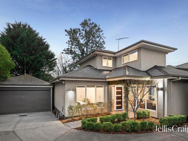 Modern comfort with ground floor master and north facing backyard