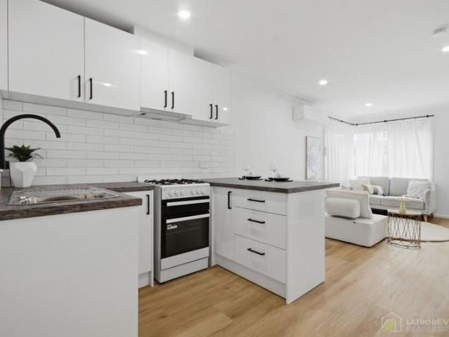 Modern comfort and effortless living in this beautifully renovated two bedroom unit