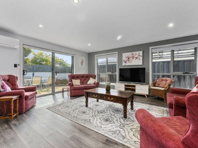 Modern comfort, effortless living in a prime Riverside location