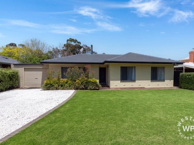 Modern comfort in an ideal location. Walking distance to shops