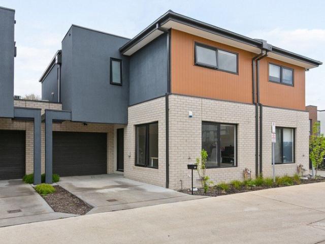Modern Comfort in South Morang Townhouse