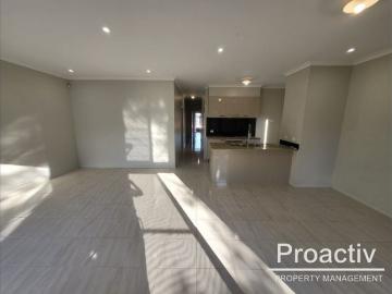 Modern Comfort & Low Maintenance Living in Prime Williams Landing Location