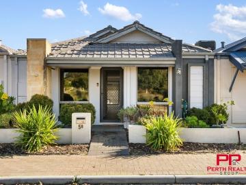 Modern Comfort Meets Low Maintenance Living!