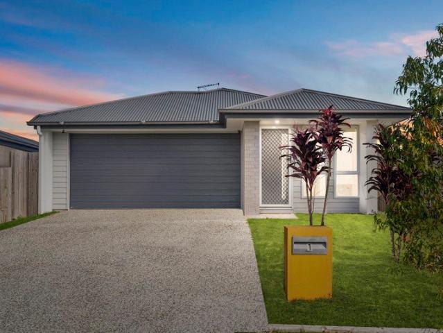 Modern Corner Block Living in the Heart of Logan Reserve!