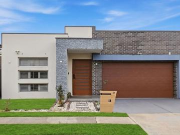 Modern custom home offering space, style and prime location!