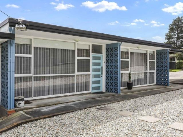 Modern and Low Maintenance Living with an Exceptional Investment Opportunity