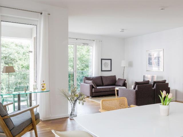 Modern and stylish 2 room apartment with great comfort, charm, and a park view