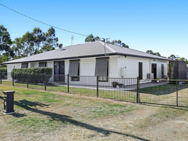 Modern and spacious living in a peaceful location perfect for entertainers!