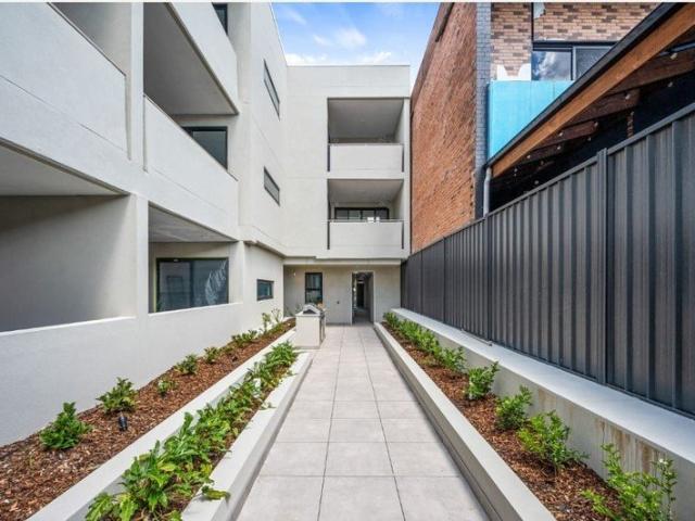 Modern Accessible Living in a Brand New Boutique Development