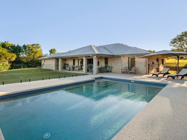 Modern Acreage Living with Premium Finishes, Pool & Exceptional Views