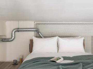Modern apartment mezzanine with 2 beds or a couch inclusive of outdoor pool, co working and gym in Munich Obersendling