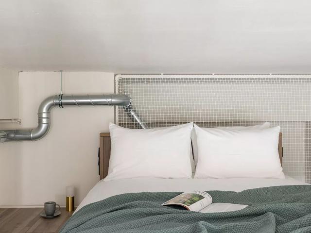 Modern apartment mezzanine with 2 beds or a couch inclusive of outdoor pool, co working and gym in Munich Obersendling