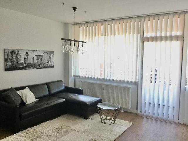 Modern apartment on the banks of the Rhine with a view of Düsseldorf, Neuss Amsterdam Apartments for Rent