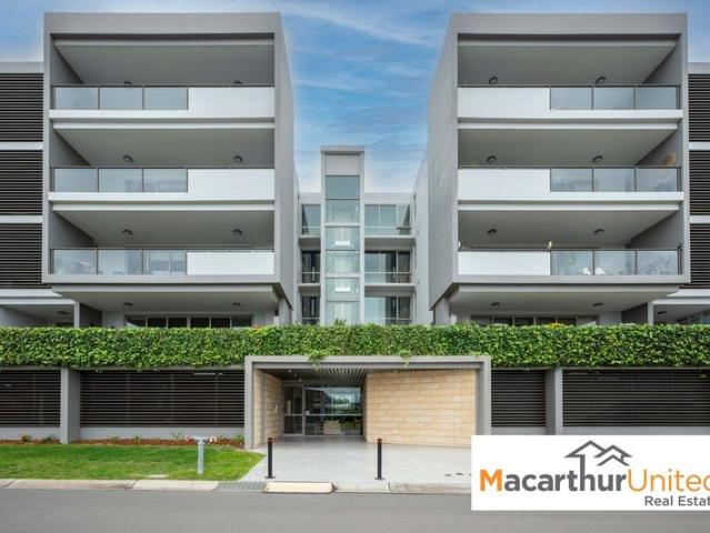MODERN APARTMENT in SOUGHT AFTER VILLAGE!