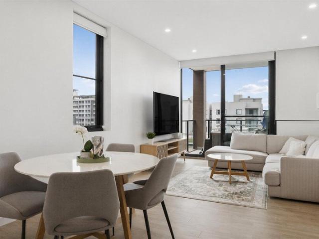 Modern Apartment Living with Spacious Interiors & Elevated District Views