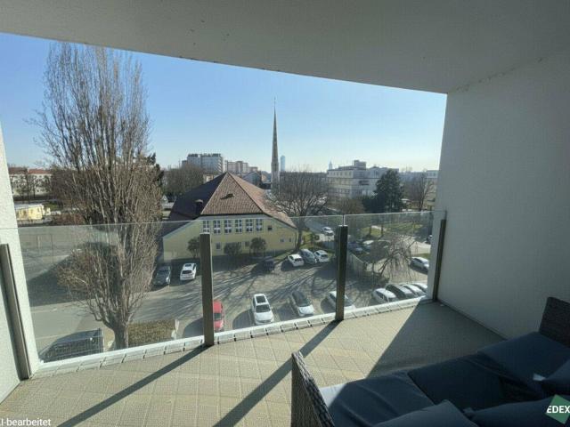 Modern Apartment with Loggia & Included Garage Parking Near Klinik Floridsdorf