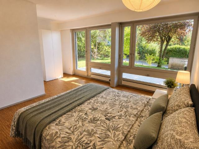 Modern apartment with nice garden view in Hongg, Zurich Amsterdam Apartments for Rent