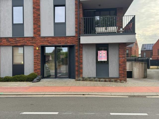Modern appartement met privatieve tuin en ondergrondse pa.