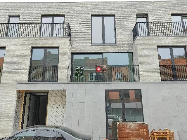 Modern appartement met 1 slaapkamer en ondergrondse autostaanplaats in het centrum van Ardooie