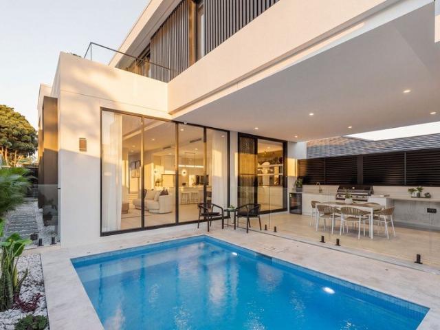 Modern Architectural Masterpiece with Luxurious Outdoor Retreat