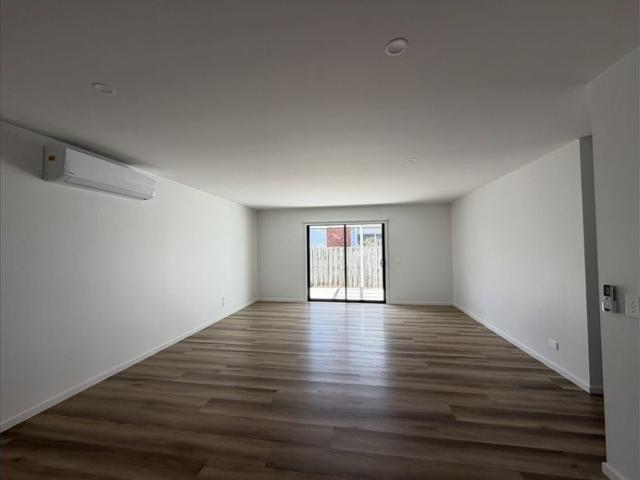 MODERN AS NEW THREE BEDROOM UNIT WITH TWO BATHROOMS