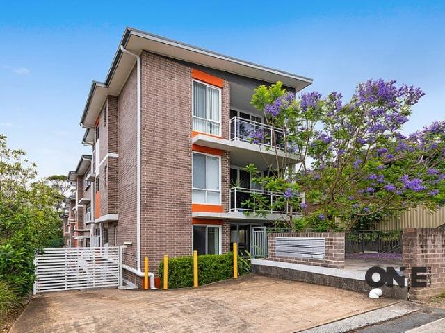 MODERN BOUTIQUE LIVING IN THE HEART OF THE ELITE SCHOOL ZONE