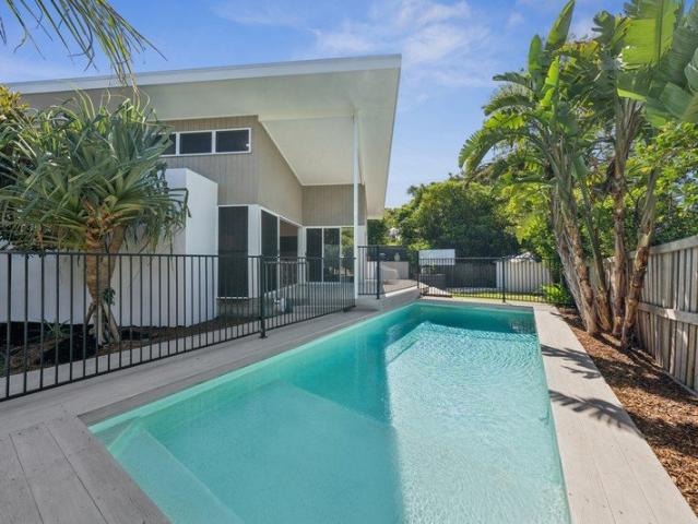 Modern Beachside Design with Family Flexibility