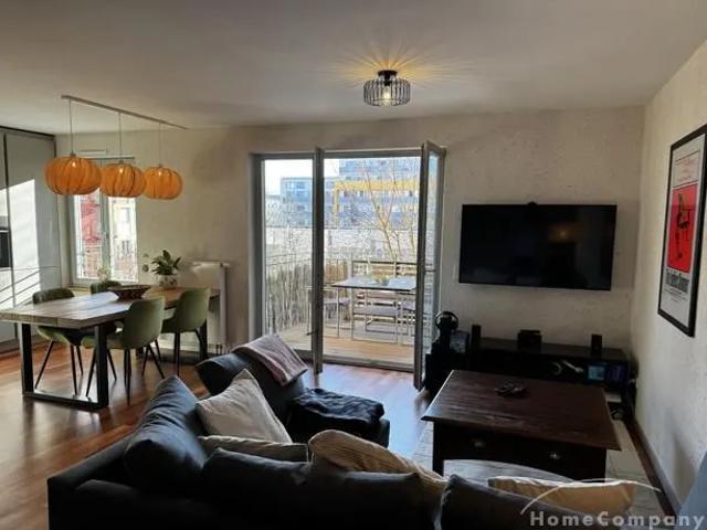 Modern, bright loft apartment with south facing balcony by Kustermann Park – central yet quiet