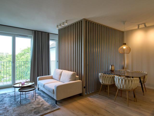 Modern building in urban location stylish fully furnished apartment on the 5th floor with balcony and parking space