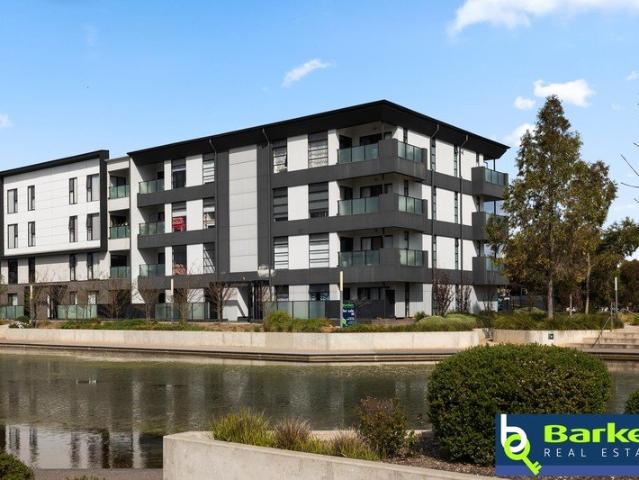 Modern Ground Floor Apartment with Lake Views & Convenient Living