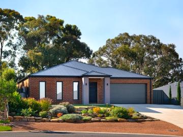 Modern design, expansive living and immaculate gardens the whole package