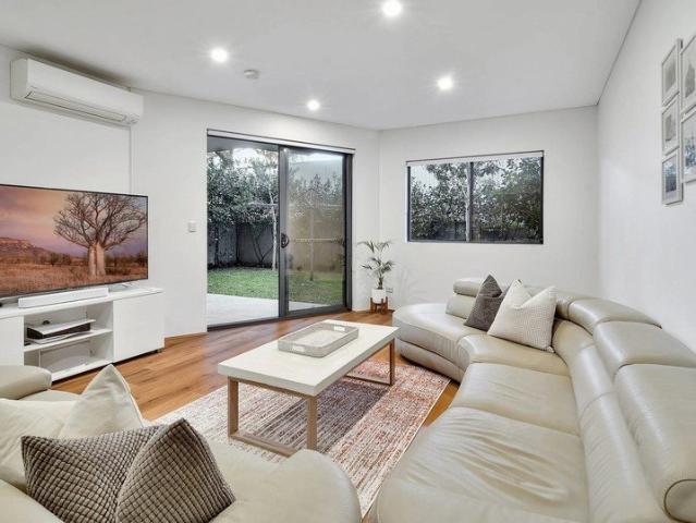 Modern design garden apartment in a sought after setting