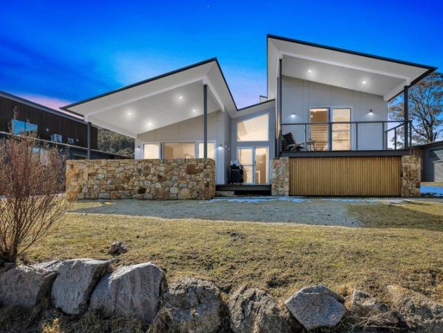 Modern Dual Key Chalet for Sale Price Guide $1,900,000